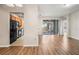 The living room offers an open floor plan with a view to the kitchen and outside deck at 2009 River Turia Cir, Riverview, FL 33578