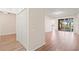 Spacious living room with wood floors leading to outdoor area at 2009 River Turia Cir, Riverview, FL 33578