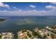 Waterfront community offering houses with private docks and water access, with city views in the distance at 2063 Illinois Ne Ave, St Petersburg, FL 33703