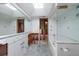 Bathroom featuring a soaking tub, skylight, large mirror and glass enclosed shower stall at 2063 Illinois Ne Ave, St Petersburg, FL 33703