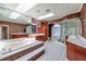 Bathroom featuring a large soaking tub, skylights, glass enclosed shower and vanity space at 2063 Illinois Ne Ave, St Petersburg, FL 33703