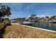 Private boat dock with a sailboat creating picturesque waterfront views and a bench to enjoy the scenery at 2063 Illinois Ne Ave, St Petersburg, FL 33703