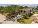Two-story home with a two car garage and pristine landscaping on waterfront property with a pool and dock at 2063 Illinois Ne Ave, St Petersburg, FL 33703