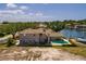 Spacious home featuring a swimming pool and waterfront access with boat dock at 2063 Illinois Ne Ave, St Petersburg, FL 33703