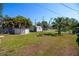Spacious backyard featuring a fire pit, above ground pool, and shed, perfect for entertaining at 2132 40Th N Ave, St Petersburg, FL 33714