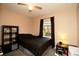 Comfortable bedroom featuring neutral walls, a ceiling fan, and a window for natural light at 2132 40Th N Ave, St Petersburg, FL 33714