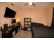 Functional bedroom with a large television, desk, and bed, perfect for relaxing or working at 2132 40Th N Ave, St Petersburg, FL 33714