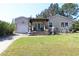 Charming single Gathering home with a spacious, well-maintained lawn and beautiful front porch at 2132 40Th N Ave, St Petersburg, FL 33714