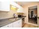 Functional kitchen showcasing stainless appliances, ample counter space, and tiled backsplash at 2132 40Th N Ave, St Petersburg, FL 33714