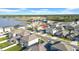 A beautiful home with a manicured lawn in a quiet neighborhood, conveniently located near a lake at 22196 Calisto Way, Land O Lakes, FL 34637