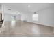 Open floor plan living space with tile flooring, lots of light and space at 22196 Calisto Way, Land O Lakes, FL 34637