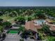 An inviting aerial view features a community pool, shuffleboard, and golf course at 2241 Shelly Dr # D, Palm Harbor, FL 34684