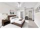 Cozy bedroom featuring a comfortable bed, soft lighting, and neutral decor creating a relaxing atmosphere at 2241 Shelly Dr # D, Palm Harbor, FL 34684