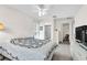 Main bedroom with carpet flooring, ensuite bathroom, and walk-in closet at 2241 Shelly Dr # D, Palm Harbor, FL 34684