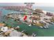 Beautiful waterfront home featuring a private boat dock with direct access to John's Pass and the Gulf at 248 137Th Cir, Madeira Beach, FL 33708