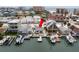 Charming waterfront home featuring a private boat dock, and serene water views at 248 137Th Cir, Madeira Beach, FL 33708