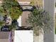 Aerial view of the property showing its proximity to the road and other houses at 251 72Nd Ave, St Pete Beach, FL 33706