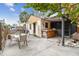 Back porch featuring a bar area, screened enclosure, and outdoor dining, ideal for entertaining and relaxation at 251 72Nd Ave, St Pete Beach, FL 33706