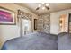 Cozy bedroom with a ceiling fan, neutral walls, and comfortable bed with a window air conditioner at 251 72Nd Ave, St Pete Beach, FL 33706