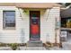 Inviting front entrance with unique door, decorative ironwork, and well-kept surroundings, offering a welcoming appeal at 251 72Nd Ave, St Pete Beach, FL 33706