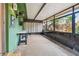 Relaxing screened patio, offering natural light and an opportunity to enjoy the outdoors at 251 72Nd Ave, St Pete Beach, FL 33706