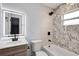 Beautiful bathroom featuring a sleek vanity, modern fixtures, and stylish tile in shower at 2801 Poinciana Ct, Punta Gorda, FL 33950