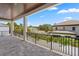 Spacious balcony with stone flooring, and a peaceful neighborhood view at 3406 W Alline Ave, Tampa, FL 33611