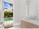Bathroom overlooking the backyard swimming pool at 3406 W Alline Ave, Tampa, FL 33611
