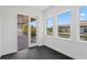 Light-filled room with sliding door access to outdoor balcony at 3406 W Alline Ave, Tampa, FL 33611