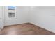 Bedroom with hardwood floors and natural light at 3406 W Alline Ave, Tampa, FL 33611