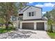 Stunning modern farmhouse with a three-car garage and inviting balcony at 3406 W Alline Ave, Tampa, FL 33611