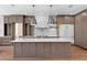 Spacious kitchen with a large island, high-end appliances, and custom cabinetry at 3406 W Alline Ave, Tampa, FL 33611
