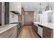 Modern kitchen featuring an expansive counter, sleek appliances, and ample storage space at 3406 W Alline Ave, Tampa, FL 33611