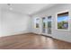 Spacious living area with doors opening onto balcony at 3406 W Alline Ave, Tampa, FL 33611