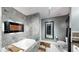 Modern bathroom featuring a soaking tub, gray marble accents, and a wall-mounted television for ultimate relaxation at 345 Bayshore Blvd # Gp10, Tampa, FL 33606
