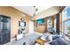 Stylish bedroom with floor to ceiling windows, city views and custom designed wall and hanging light fixture at 345 Bayshore Blvd # Gp10, Tampa, FL 33606