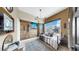Stylish bedroom with floor to ceiling windows, city views and custom designed wall and hanging light fixture at 345 Bayshore Blvd # Gp10, Tampa, FL 33606
