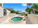 Community hot tub with spa rules and a view of the swimming pool and lush landscaping at 345 Bayshore Blvd # Gp10, Tampa, FL 33606