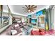 A large living room features a leather sectional, modern decor, and hardwood floors at 345 Bayshore Blvd # Gp10, Tampa, FL 33606