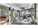 Spacious living room with hardwood floors, a fan, and large windows with a view at 345 Bayshore Blvd # Gp10, Tampa, FL 33606