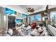 Open-concept living room with modern decor, hardwood floors, and a view of the city skyline at 345 Bayshore Blvd # Gp10, Tampa, FL 33606