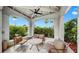 Covered outdoor seating area with comfortable furnishings and views of lush landscaping at 345 Bayshore Blvd # Gp10, Tampa, FL 33606