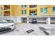 A view of a parking spot with cars parked below condos that include balconies and many windows at 345 Bayshore Blvd # Gp10, Tampa, FL 33606