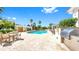 Bright pool area with an outdoor kitchen, seating, and palm trees creating a resort-like setting at 345 Bayshore Blvd # Gp10, Tampa, FL 33606
