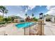 Community swimming pool with lounge chairs and a waterfall feature for a luxurious experience at 345 Bayshore Blvd # Gp10, Tampa, FL 33606