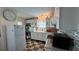 Bright and functional kitchen with ample counter space, white cabinets, and modern appliances for meal preparation at 3829 Chah Dr, Zephyrhills, FL 33541