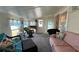 Bright living room featuring comfortable seating and an open layout, ideal for relaxing at 3829 Chah Dr, Zephyrhills, FL 33541