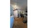 Functional storage room with ample shelving, perfect for organizing household items and tools at 3829 Chah Dr, Zephyrhills, FL 33541