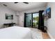 Bright bedroom featuring balcony access, with lovely views at 389 Bayview Ne Dr, St Petersburg, FL 33704