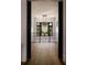 Upstairs hall with chandelier and view at 389 Bayview Ne Dr, St Petersburg, FL 33704